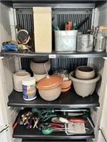 3-shelves of gardening items, not the cabinet..