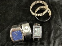 4 watches, needs new batteries, bracelets and