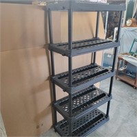 Brown plastic storage shelf measures 72"h 36"w