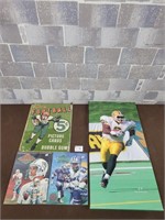 Football tin sign, canvas wall art, and books