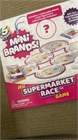 New Mini Brands Supermarket Race game includes