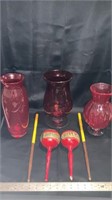 Red glass vases, drum sticks maracas