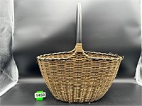 Rope over wire frame handled basket