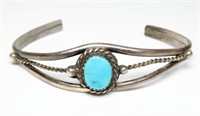 Sterling silver cuff bracelet with center bezel