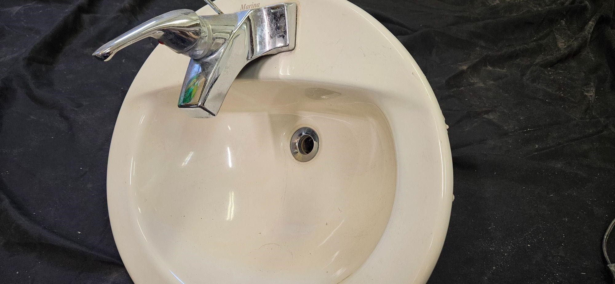 bathroom sink used good condition with faucet