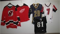 (3) Youth Large football jerseys including Los