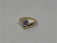 Ring Marked 14K with 4-Diamonds & 1-Purple