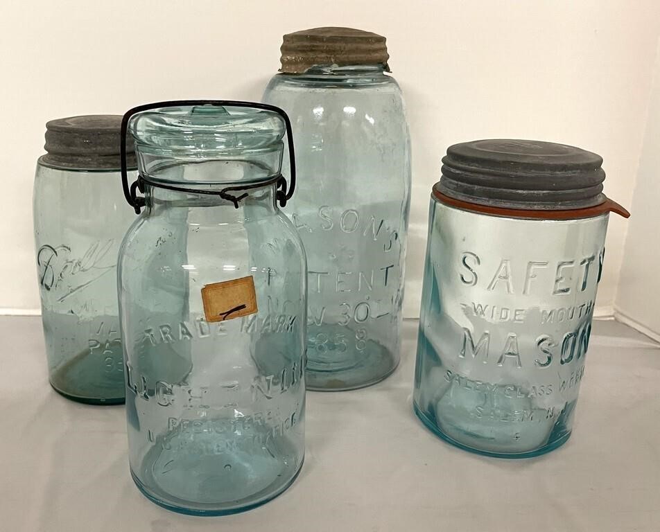 Four Antique Canning Jars with Lids