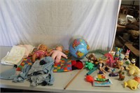 2 dolls, doll blankets and other toys