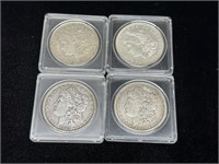 Four US Morgan Dollars: 1879, 1882, 1891, 1921