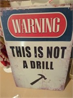 Metal sign WARNING, THIS IS NOT A DRILL!, approx