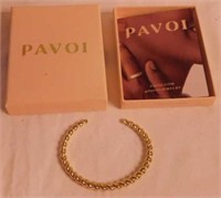 Pavoi goldtone bangle bracelet in box -