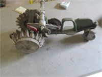 vintage cast iron sprinkler tractor
