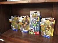 4 TOY STORY FIGURES STILL IN ORIGNAL PACKAGING
