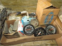 Box of Tachs & Speedos Mack Electric Speedo Head.