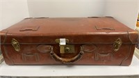 Vintage suitcase with linens