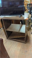 FAUX WOOD TV STAND (16"D X 25"W X 30