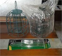 2 squirrel proof bird feeders and rain gauge