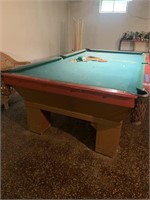 Antique Brunswick pool table in Basement