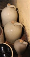 3 stoneware jugs, graduated, smallest is 12.5" hig