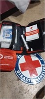 2 American red cross first aid kits and 1 sticker