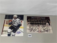 AUTOGRAPHED TEAM AND PENGUIN PLAYER PHOTOGRAPH