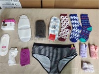 All new. Socks. Slippers. And panties size 8, 9,