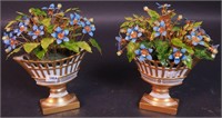 A pair of enameled blue metal flowers in