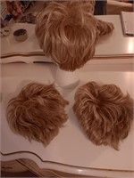 3 Raquel Welch wigs.