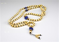 An ivory beaded necklace
