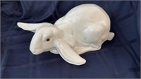 White glazed red clay pottery rabbit figure,