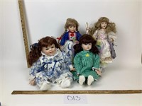 Lot of 4 Porcelain Dolls - See Description
