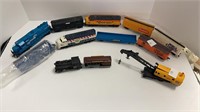 BOX OF TRAINS: (4) ENGINES & (8) TRAIN CARS