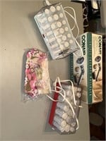 Various self care items, hair rollers, massager,