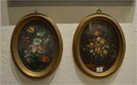 Two decorative oval floral paintings