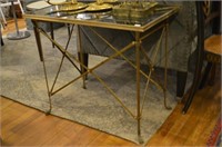 Pair of black marble and brass side tables