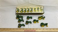 8 John Deere miniature toy tractors