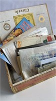 Cigar box of vintage stamps