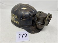 Coal miner's hat with carbide lamp