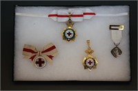 21 medals/pins: Red cross, various countries.