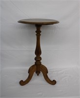 17" round butter nut table with carved 3 leg base