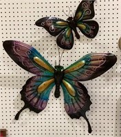 Two beautiful metal butterflies which hang on the
