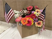 Silk flowers and flags