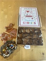 CHRISTMAS COOKIE CUTTERS, CAST IRON TRIVET, AND A