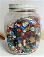 JAR OF GLASS MARBLES AND PENNIES