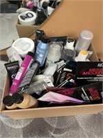 Box of Redken hair products- small sizes