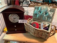CLOCK AND BASKET OF SEWING NOTIONS
