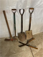 Shovels, pickax, spade, hedge trimmers