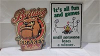 2 large metal signs