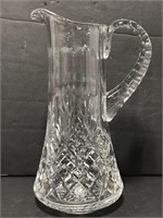 Ornate cut glass entertaining pitcher